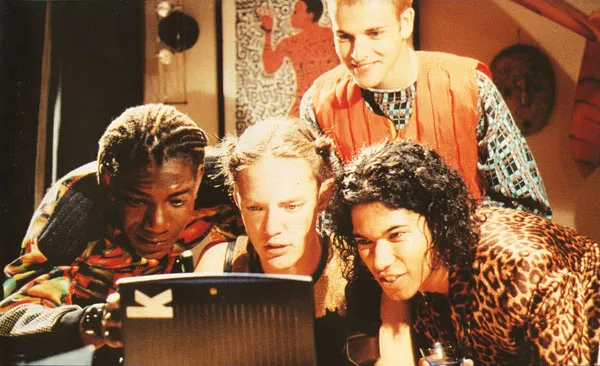 Friends playing Final Fantasy 7 on a CRT television